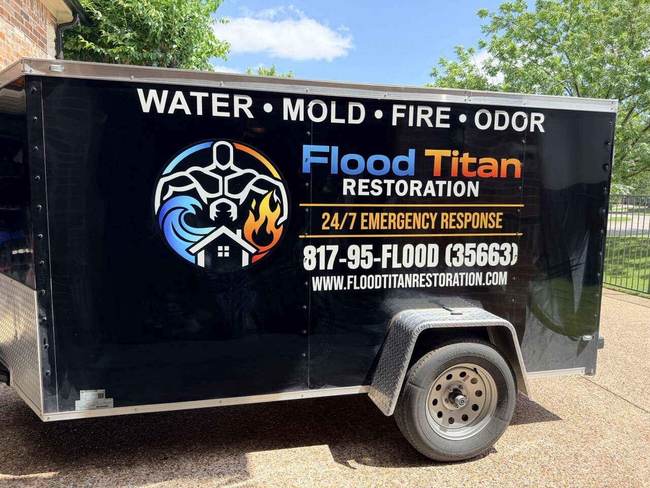 Flood Titan Restoration branded service trailer with 24/7 emergency response